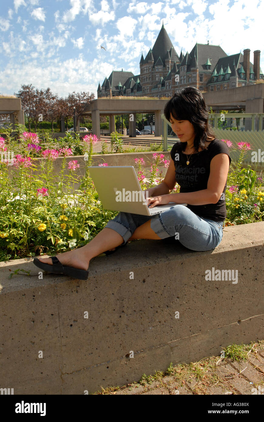 Montrealer with her laptop in old Montreal Quebec Canada Stock Photo