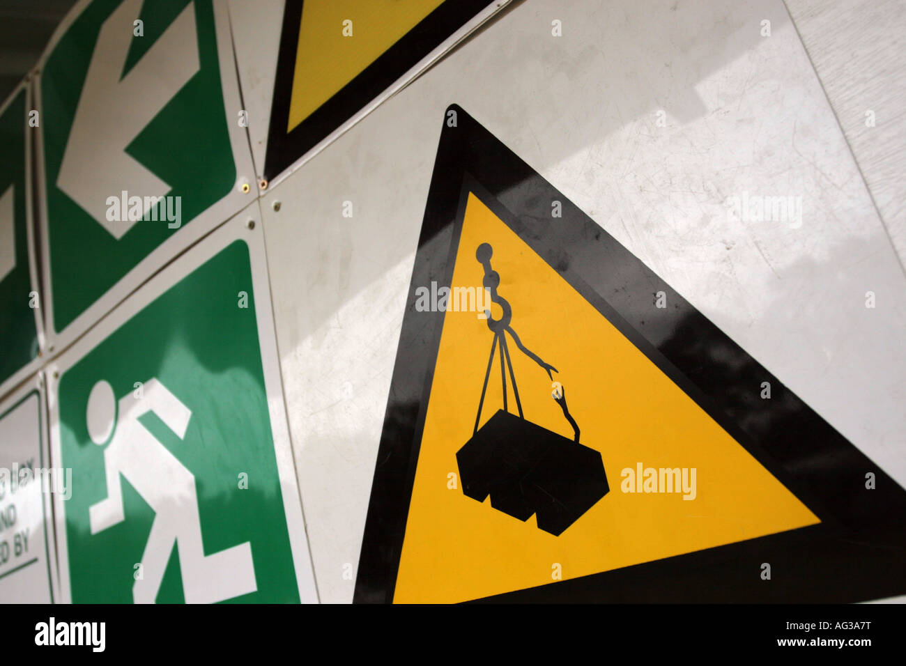 Sign with direction and warning signals on construction site Stock Photo