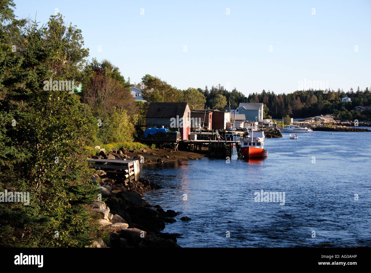 fishing village at sunset, Herring Cove, Nova Scotia, Canada. Photo by