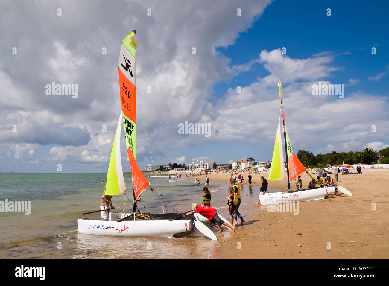 Launching yachts from the beach at La Tranche sur Mer, Vendée, Pays de la Loire, France Stock Photo