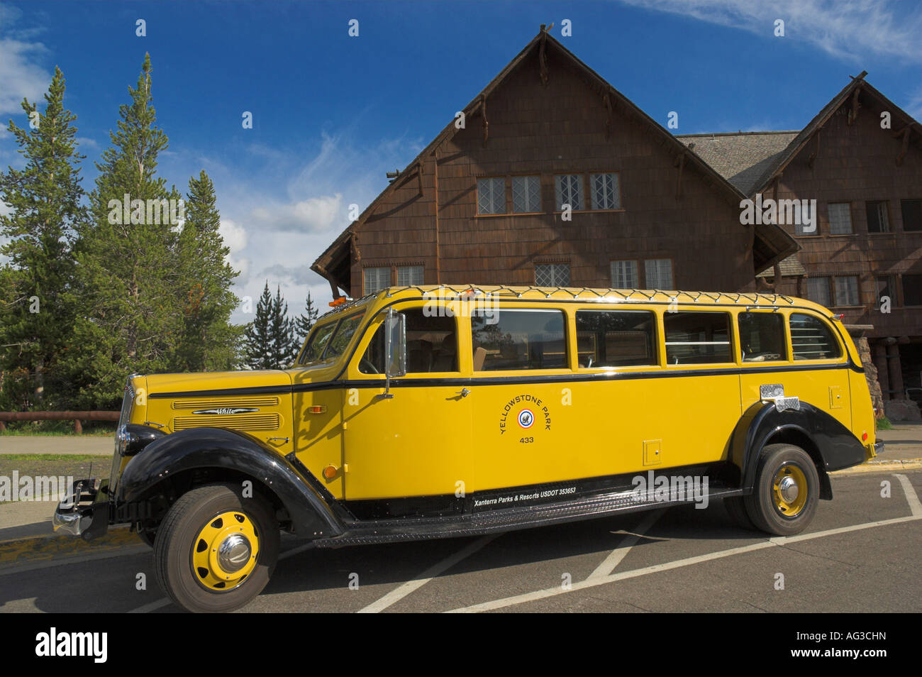 yellowstone tour bus outside the old faithful inn yellowstone national