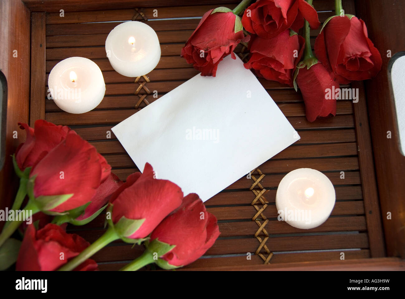 Roses and note paper Stock Photo - Alamy