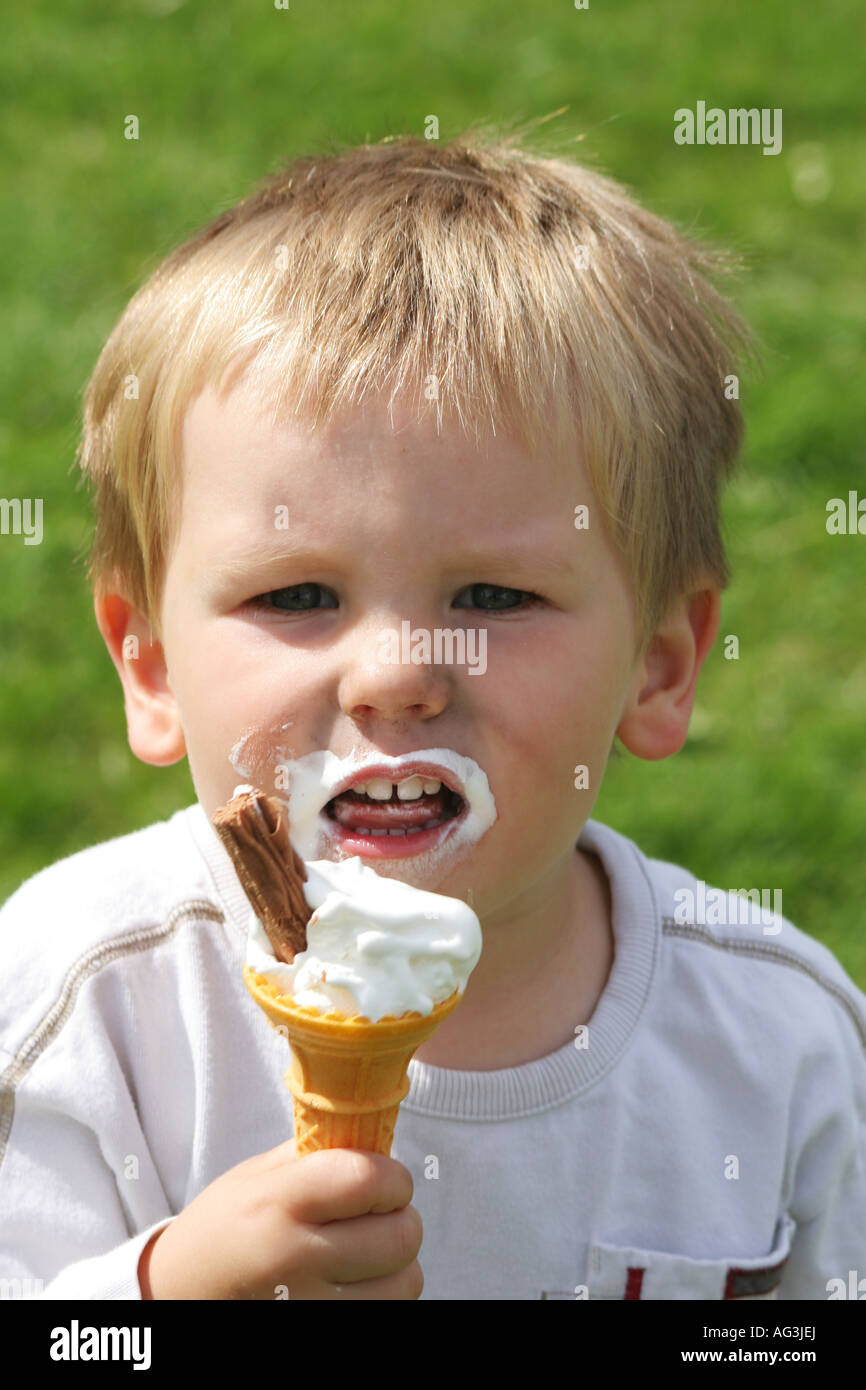 Child eating ice cream. Flake 99. 3 year old boy Stock Photo Alamy
