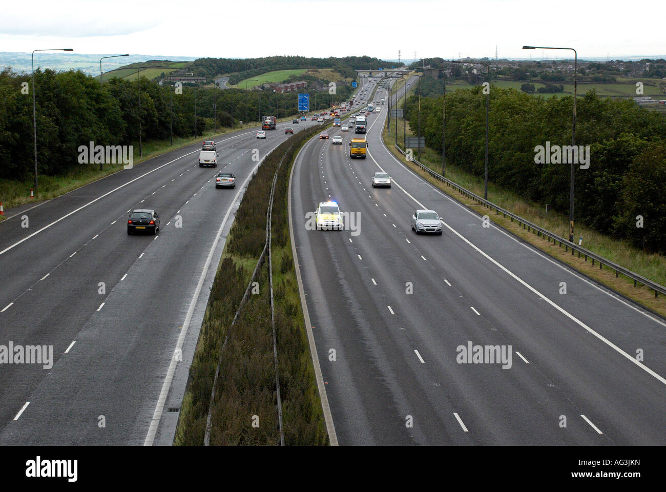 emergency vehicle speeding down the motorway Stock Photo