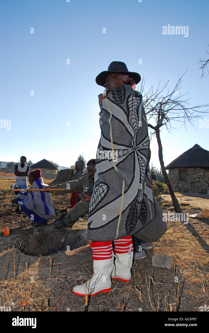 Basotho man wrapped in blanket to protect against the bitterly cold winter weather in the Maluti mountains of Lesotho, Africa Stock Photo