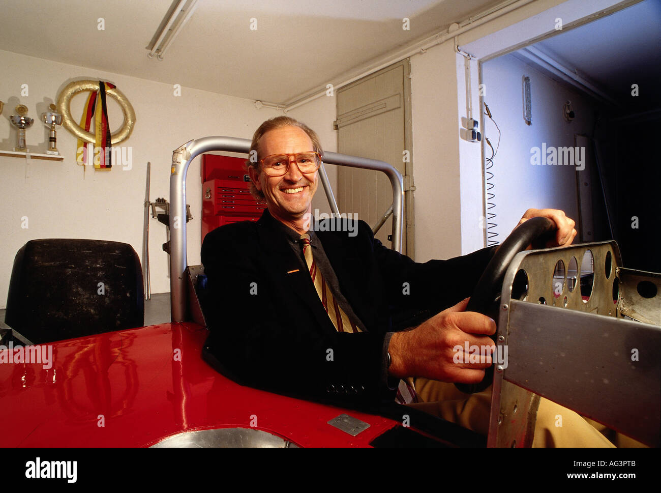 Lagaay, Harm, * 28.12.1946, Dutch car designer (Porsche), half length, sitting in car, 1996, Stock Photo