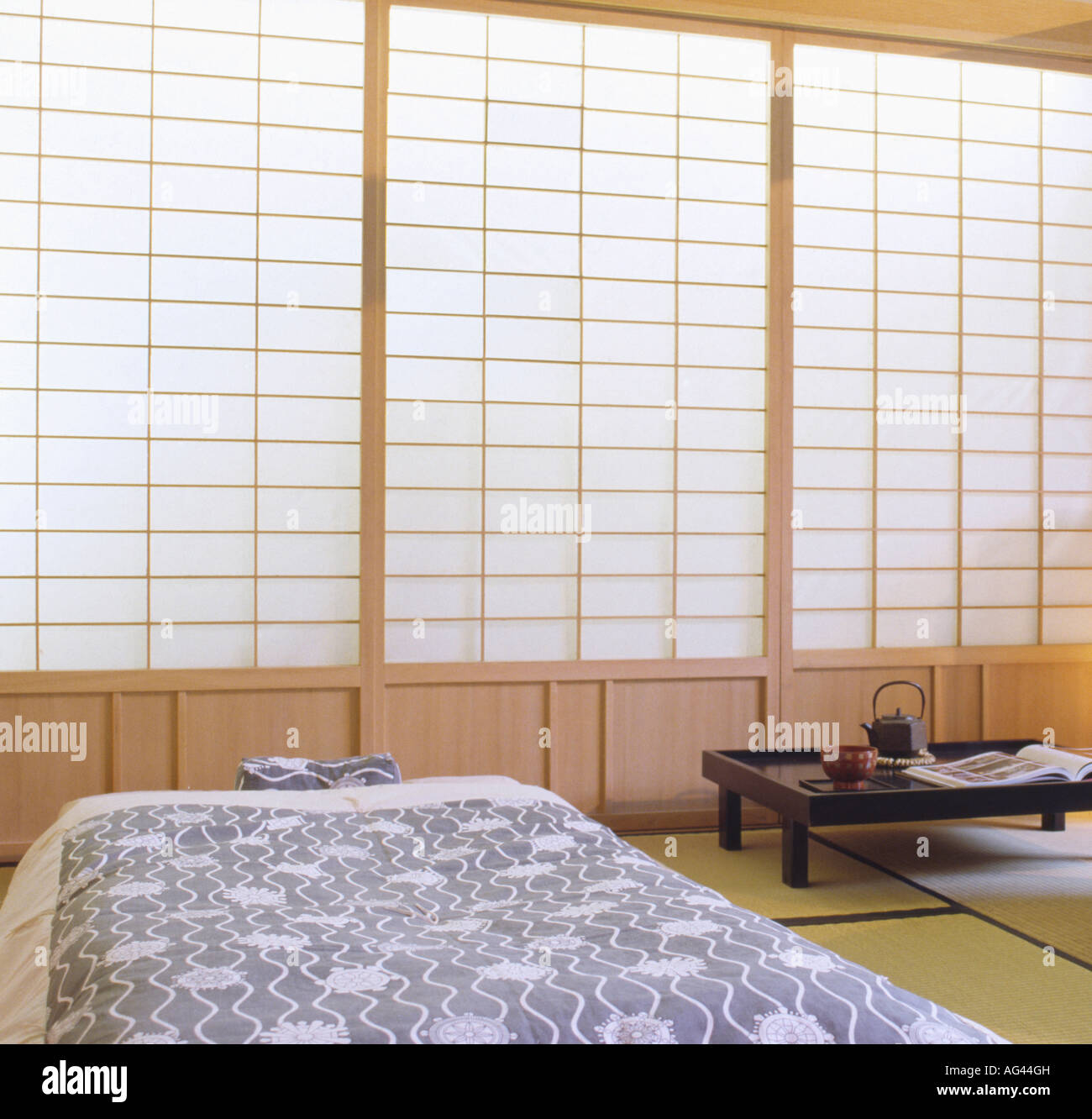 Japanese tatami screens in oriental style bedroom with blue & white