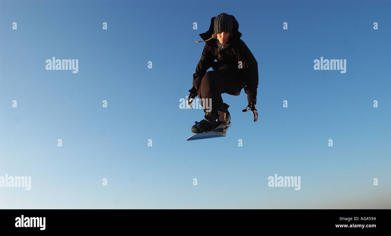 Snowboarder in mid air  Stock Photo