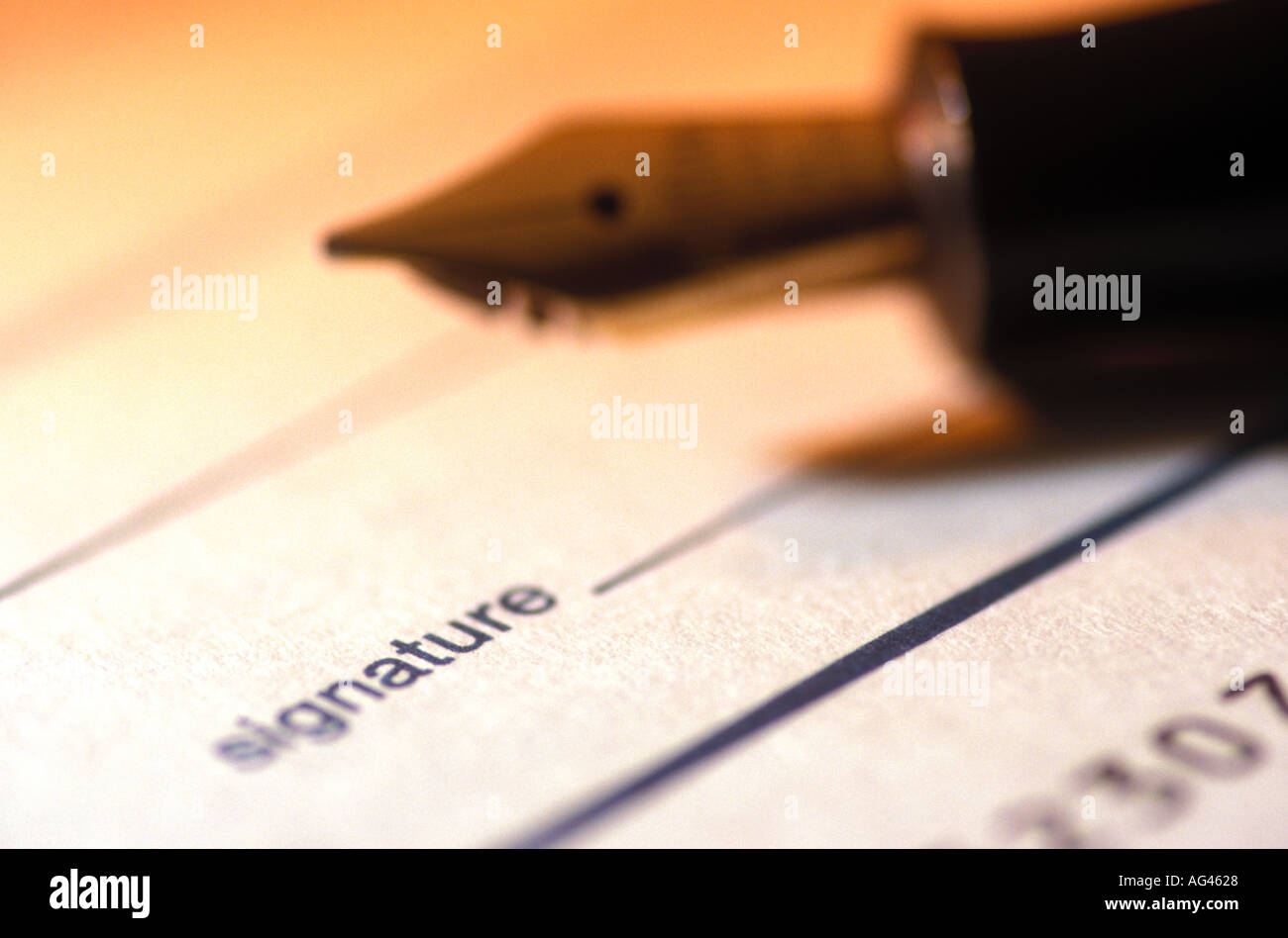 Pen and cheque signature line Stock Photo Alamy