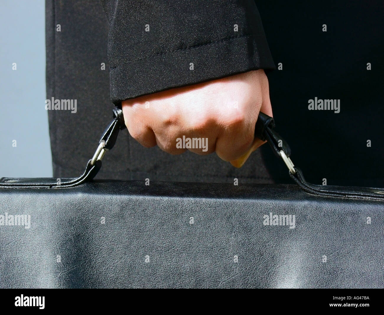 Hand carries briefcase Stock Photo Alamy