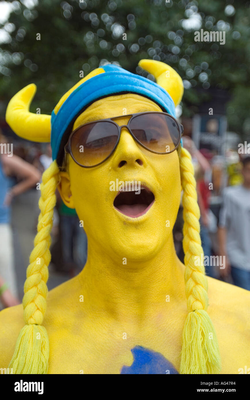 Swedish football fan painted in national colours in Berlin during World Cup 2006 in Germany Stock Photo