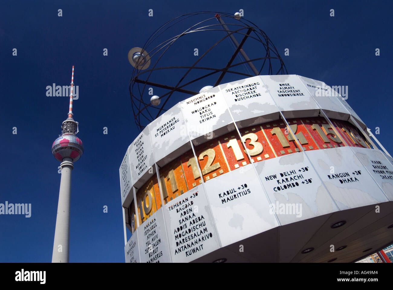 World Time Clock and the Television Tower in Alexanderplatz in Berlin Stock Photo