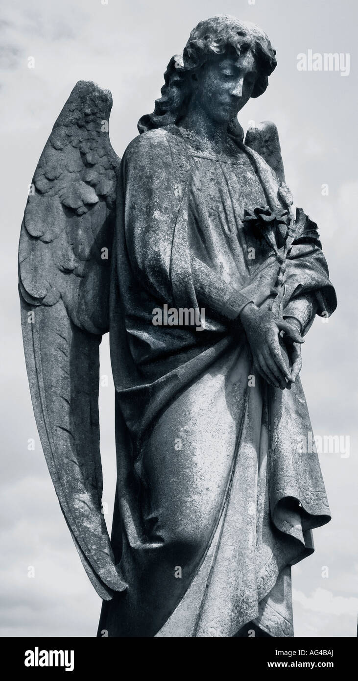 Statue of merciful angel Stock Photo - Alamy