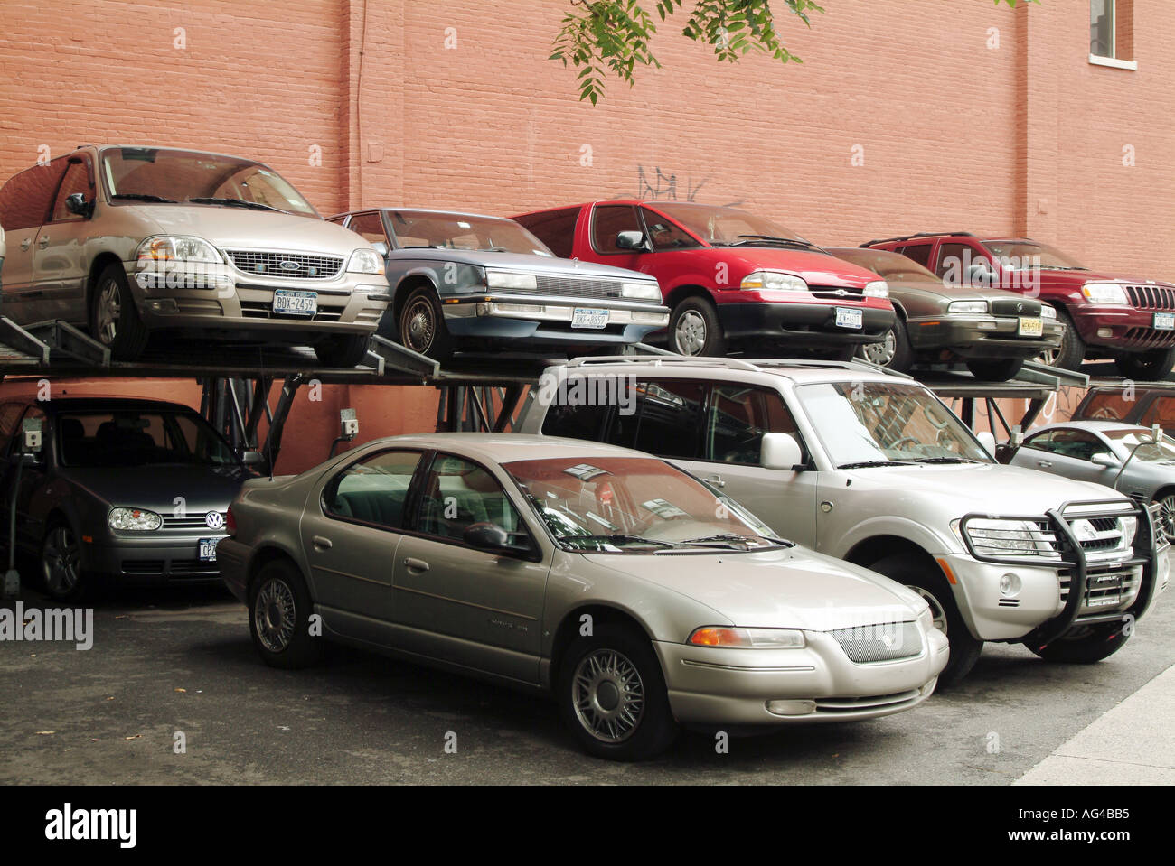 double stacking car parking in new york Stock Photo - Alamy
