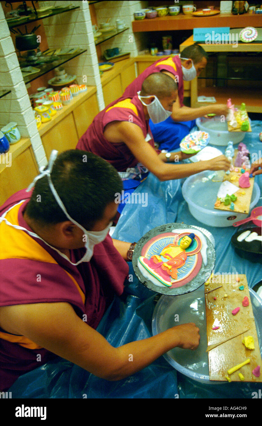 ASB79427 Tibetan monks making butter sculptures of Lord Gautam Buddha Stock Photo