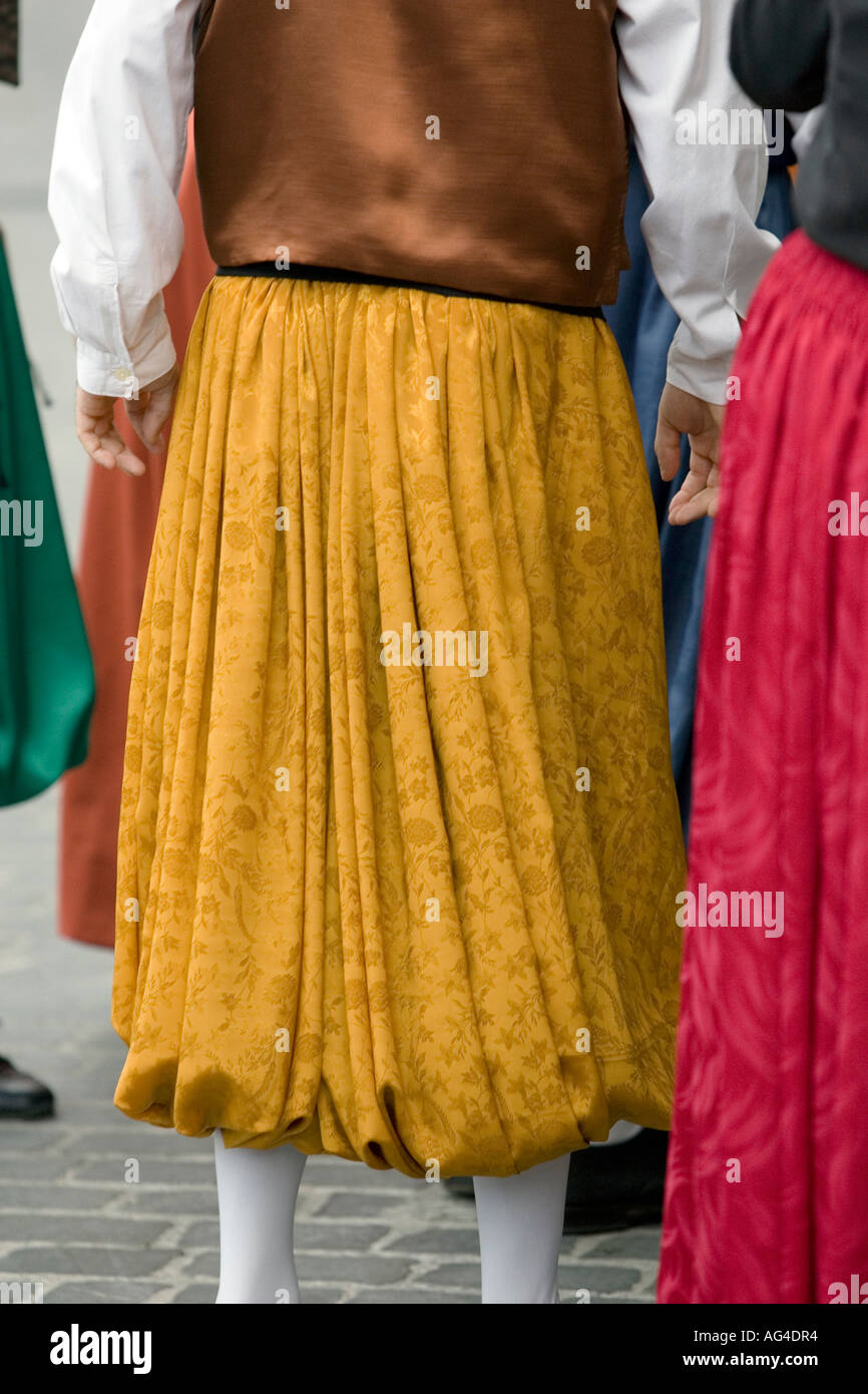 Golden yellow trousers or pantaloons worn by male Spanish dancer, Plaza