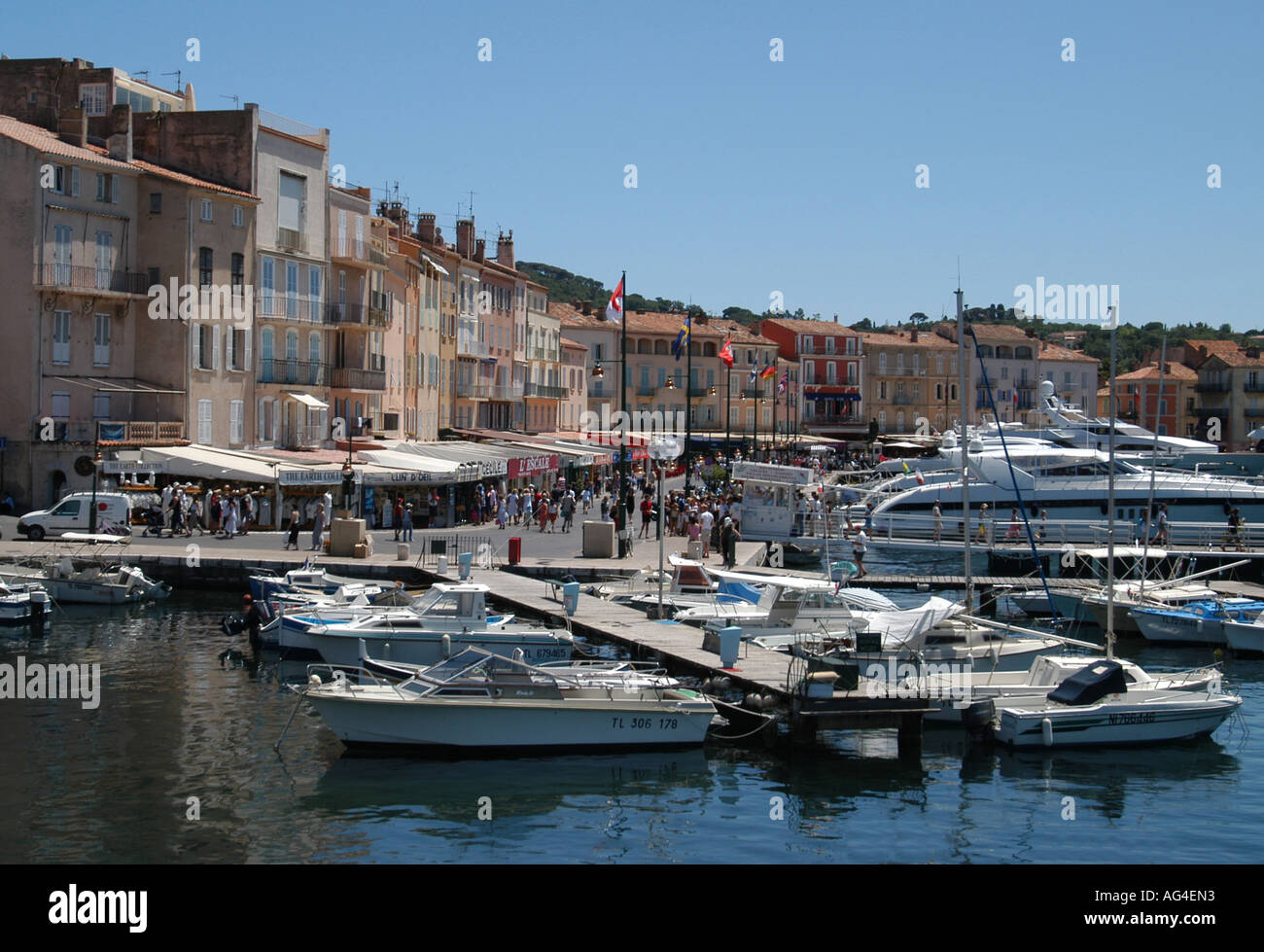 The colourful buildings of St Tropez Port with boats, yachts and motor ...