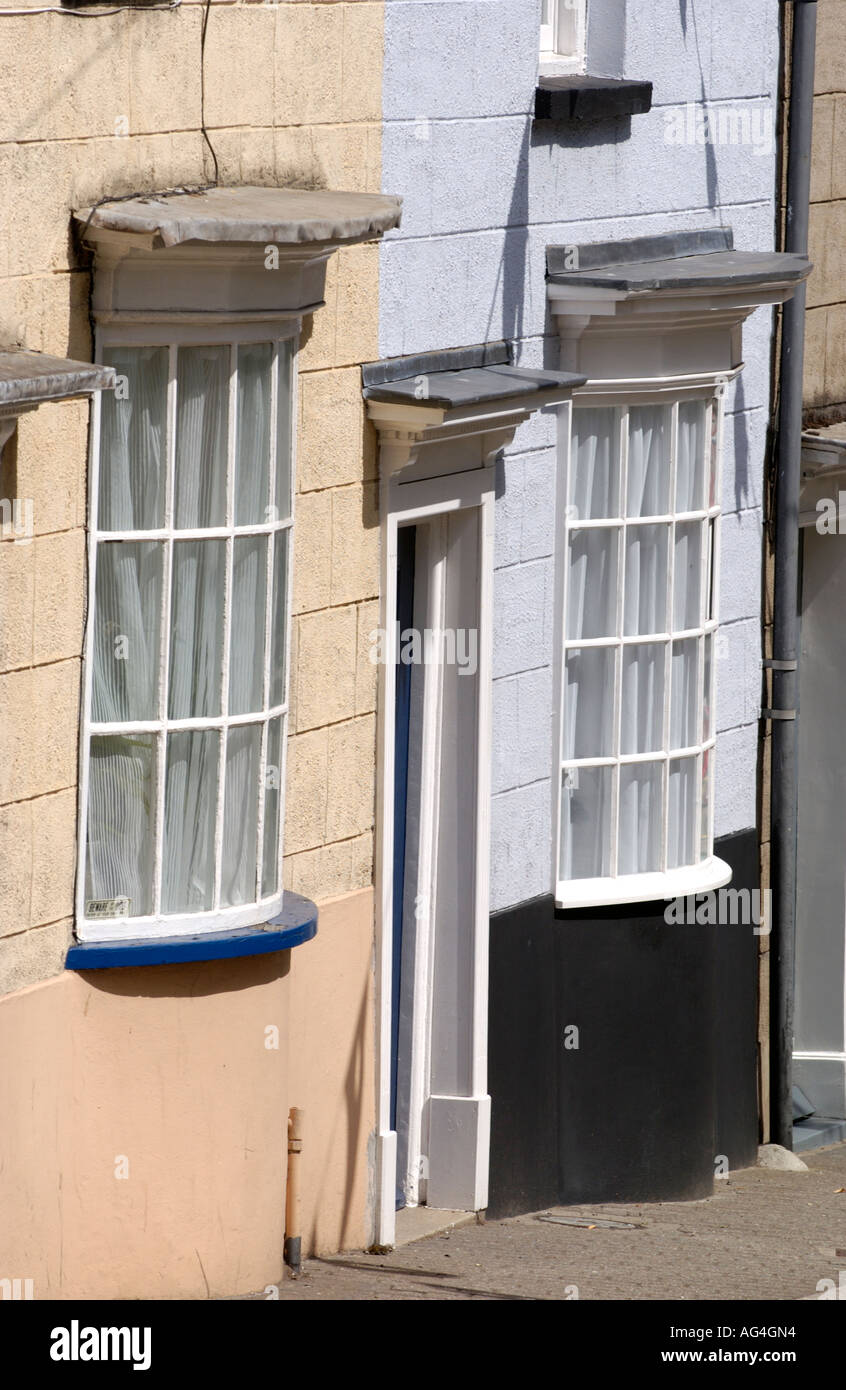 Georgian period terraced houses with bow fronted bay windows in town Chepstow Monmouthshire South East Wales UK Stock Photo