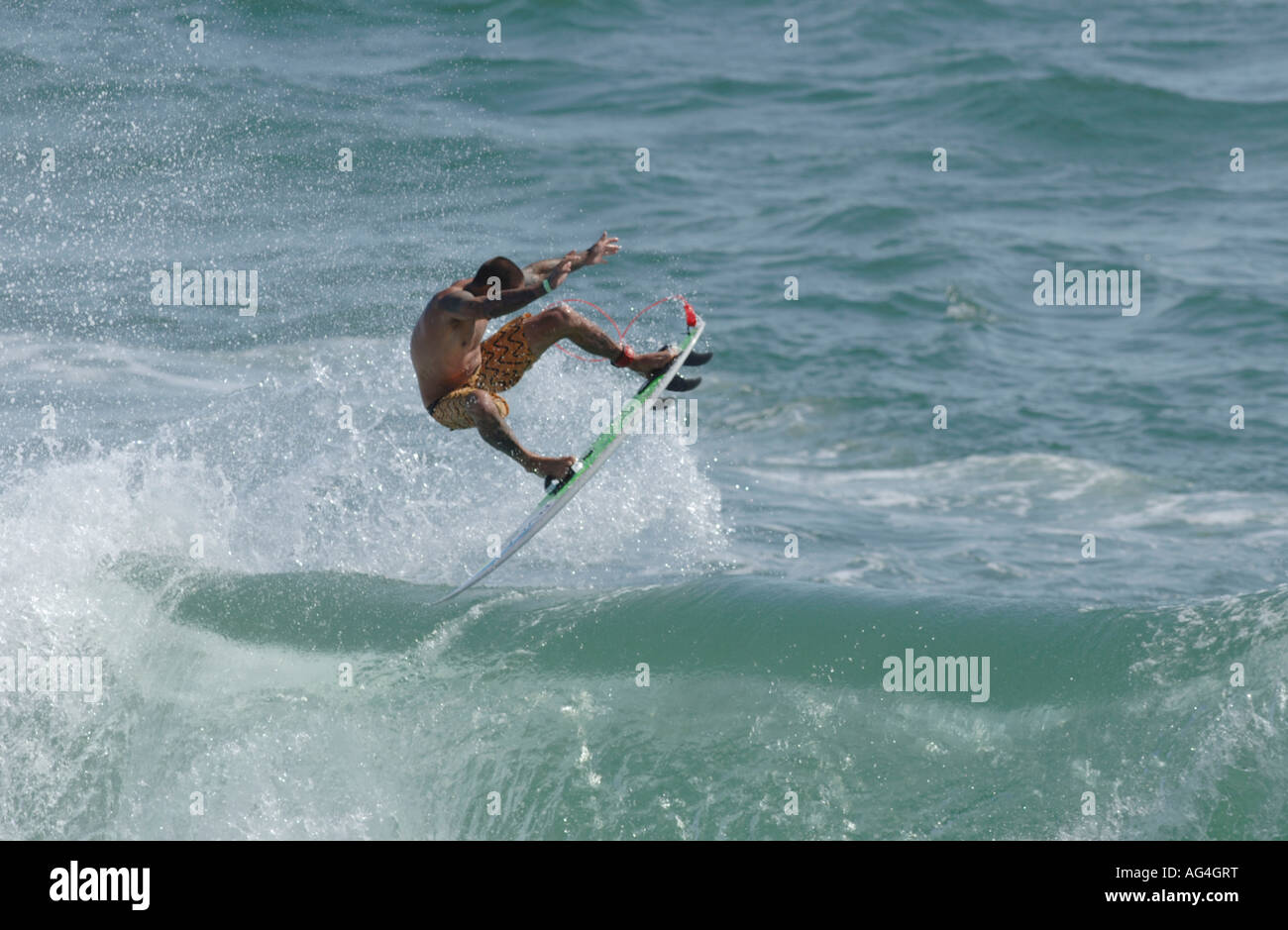 Professional surfer Christian Fletcher flying through the air in