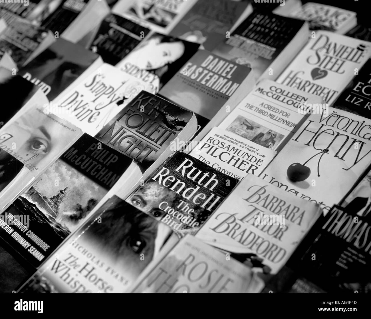 Closeup of a row of secondhand books on a market stall Stock Photo