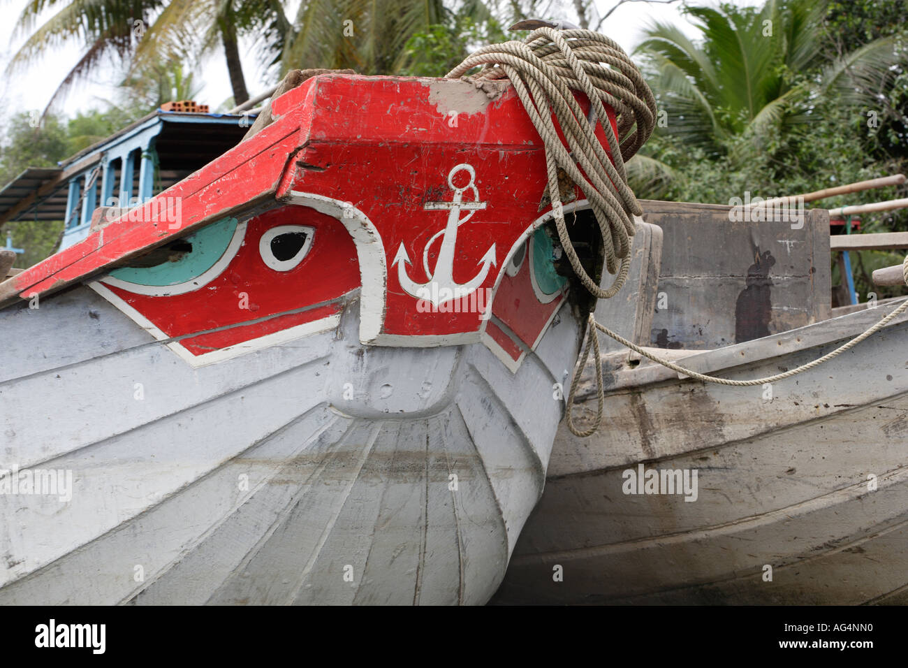 Boat in Vietnam with eyes and anchor motif Stock Photo