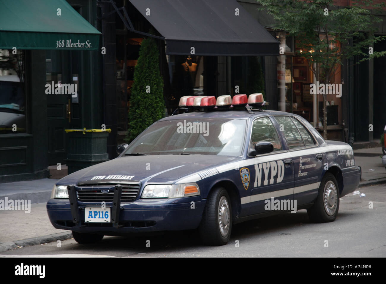 An NYPD Auxiliary police car parked in Bleecker Street Greenwich Village Stock Photo