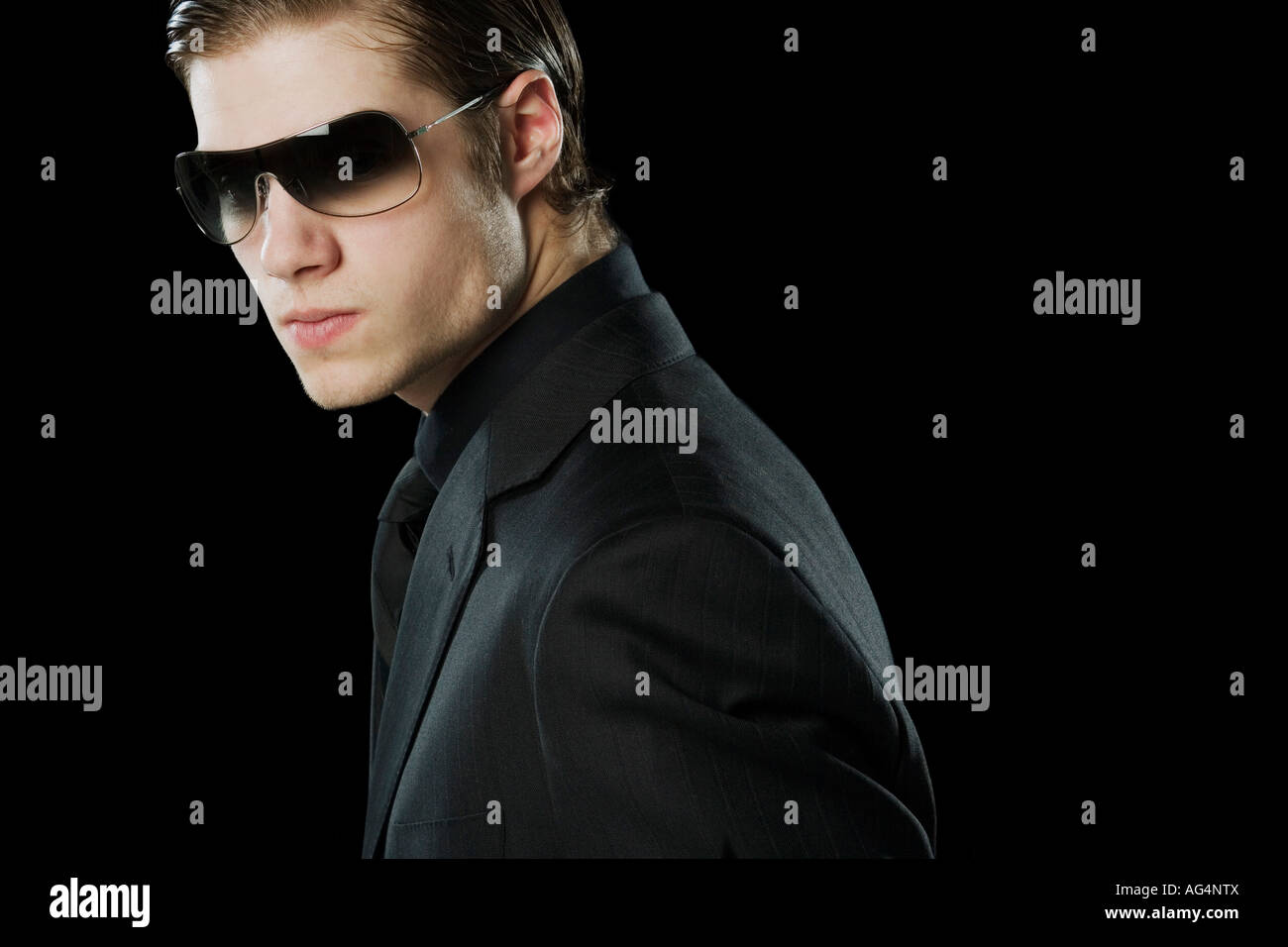 Man wearing a suit and sunglasses Stock Photo - Alamy