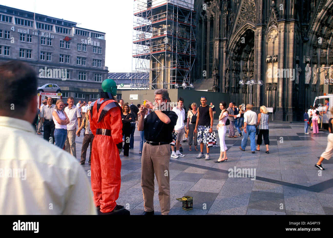 Germany North Rhine Westphalia Cologne Street performare infront of Cologne Cathedral Stock Photo