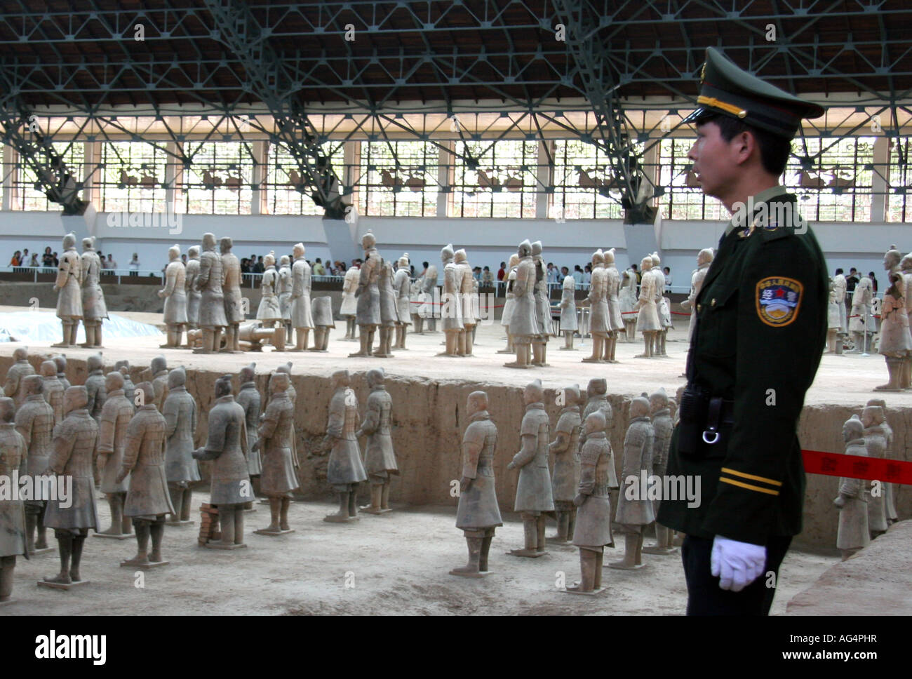 Soldier standing guard over the Terracotta Warriors in China Stock Photo