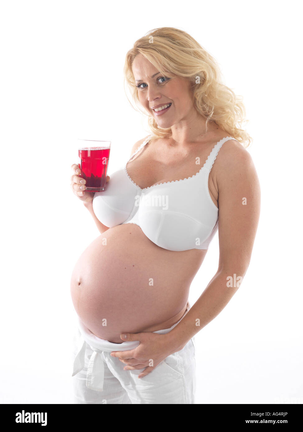 Pregnant Woman Drinking Cranberry Juice Model Released Stock Photo Alamy
