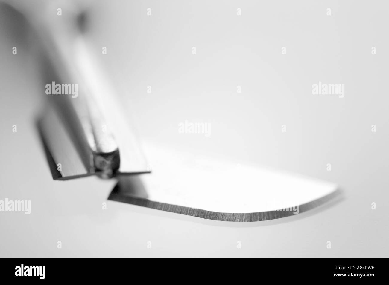 Snapped scalpel blade Stock Photo