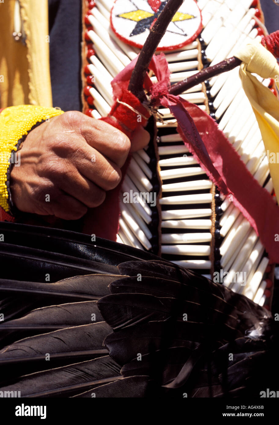 Native American dancers in Western Plains traditional dress with eagle feathers Stock Photo