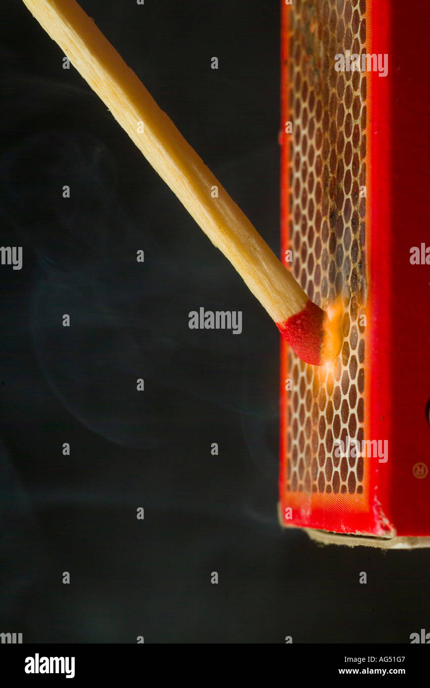 A match being struck against a matchbox Stock Photo Alamy