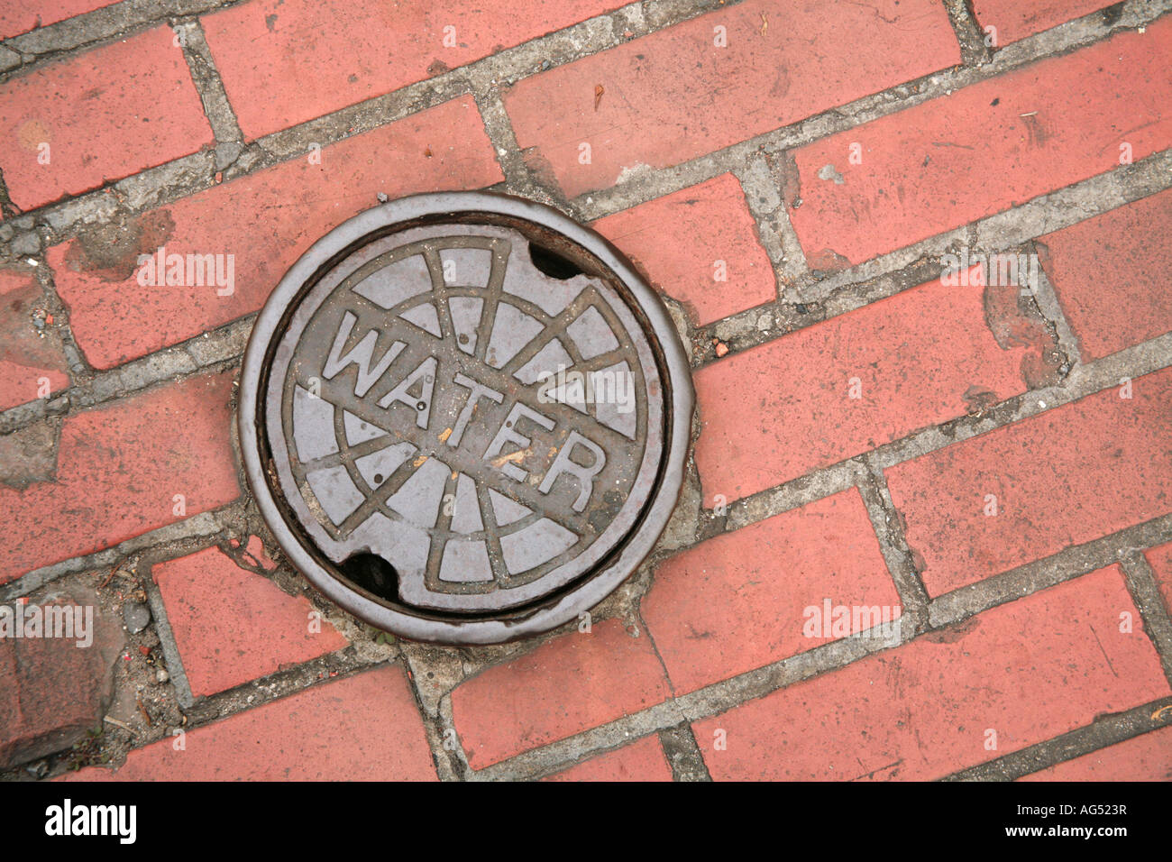 A water cap on a street on the old part of a colonial city at Panama