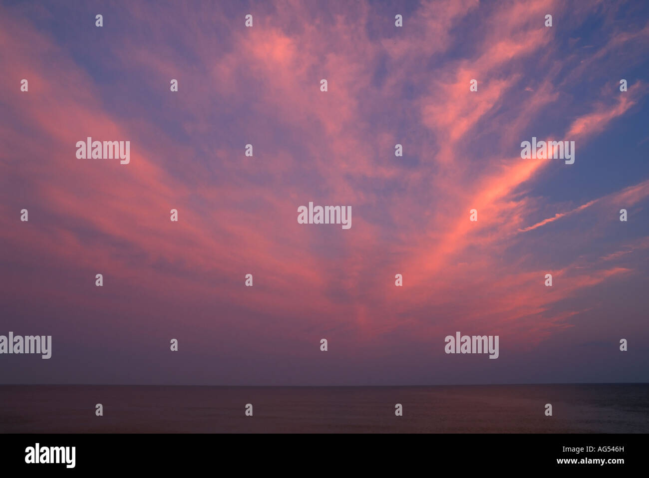 clouds at dusk, ocean Stock Photo - Alamy
