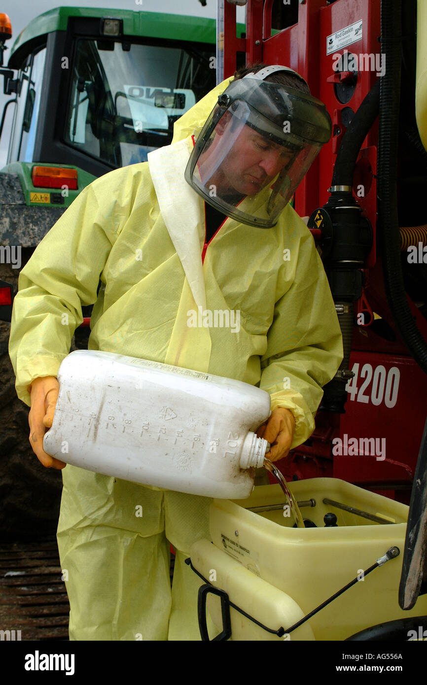 Protective farmer pesticide clothing hires stock photography and