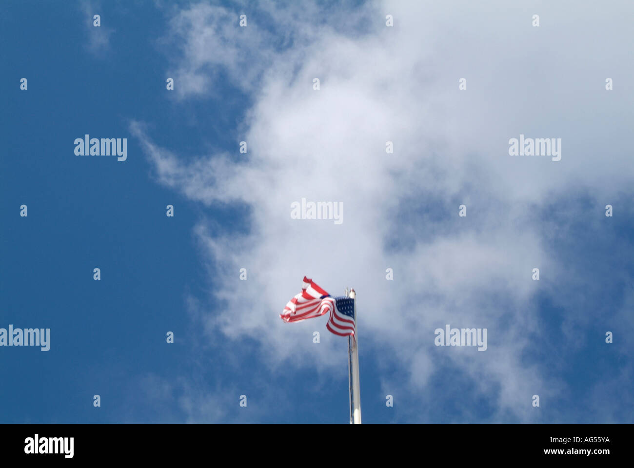 AMERICAN FLAG AGAINST BLUE SKY AND WHITE CLOUD USA Stock Photo - Alamy