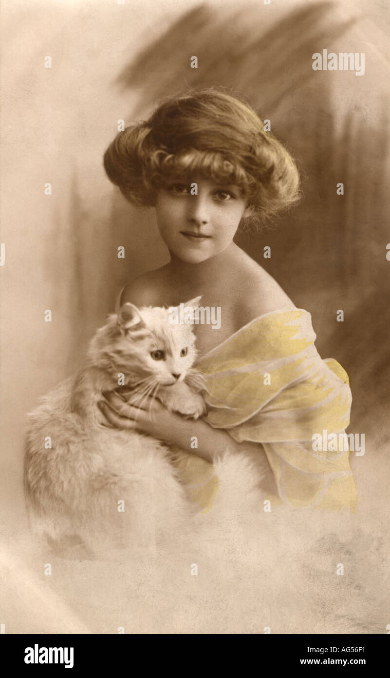 Hand Tinted Portrait of a Young French Girl with Cat circa 1915 Stock Photo