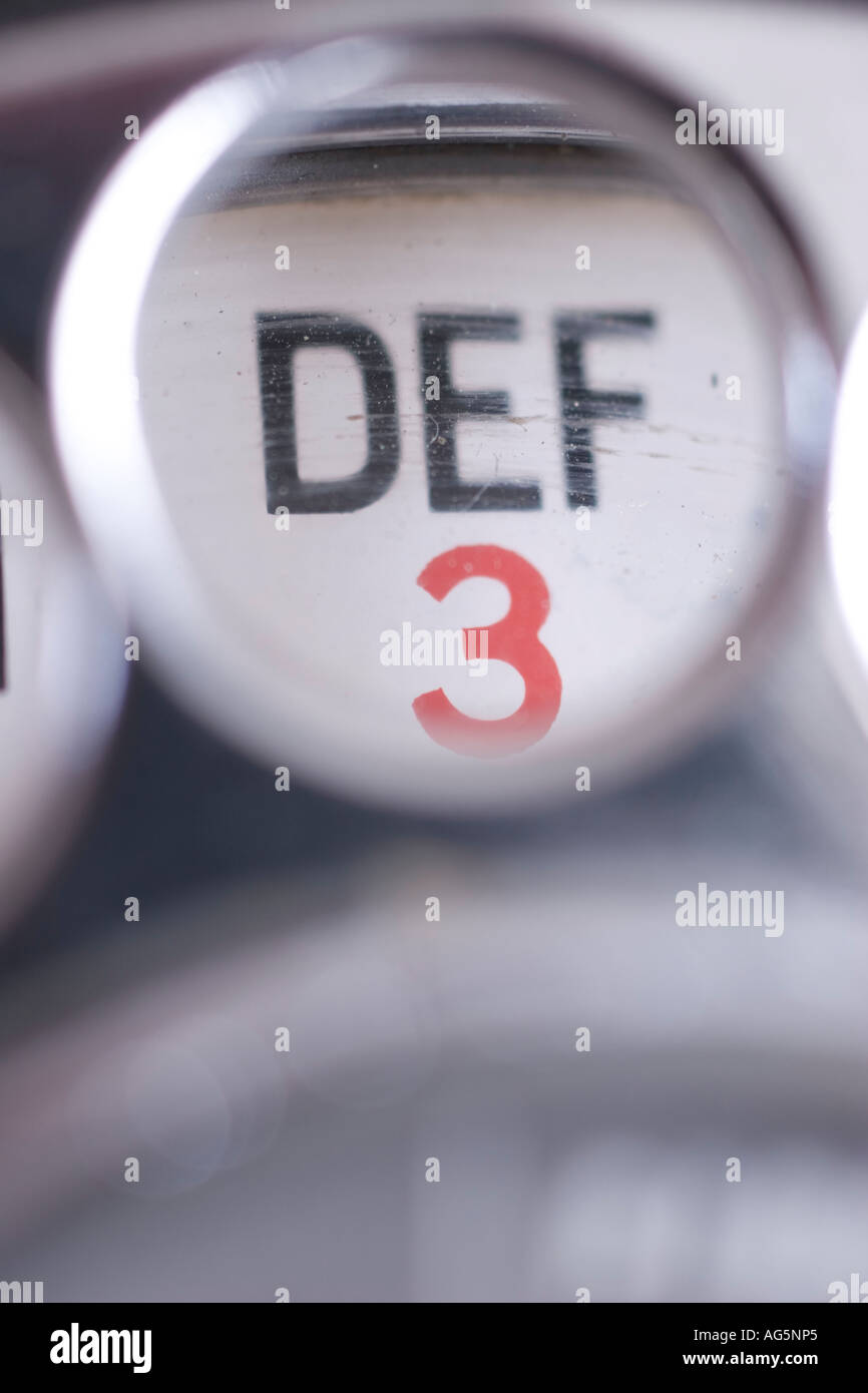 3 three Close up of Number and letters on old Bakelite telephone with rotary dialer Stock Photo
