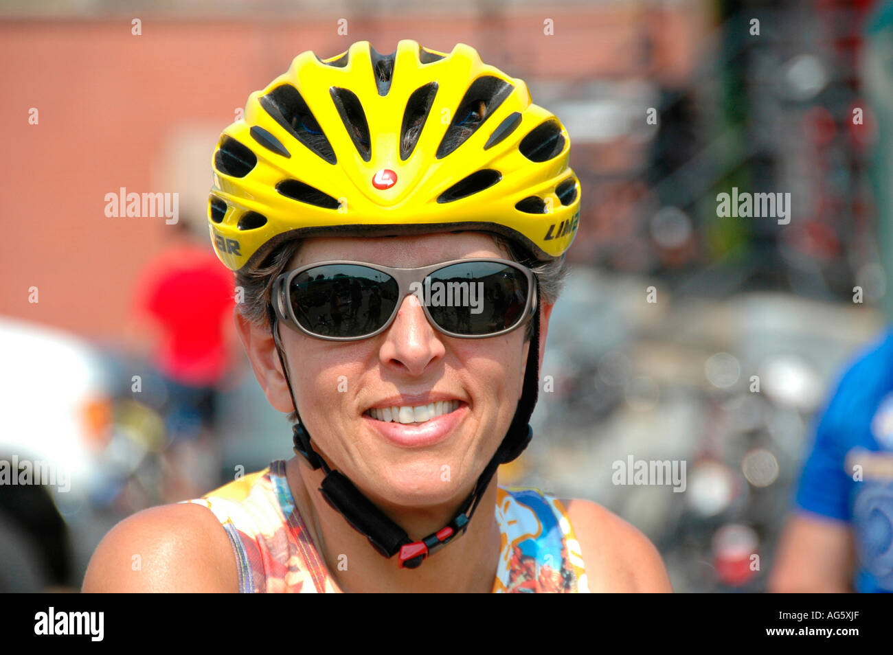 Bike Bicycle riders with real safety helmets for safe riding by adult men and women on public