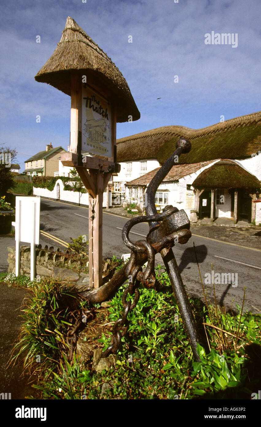 Devon Croyde village thatched houses and anchor Stock Photo