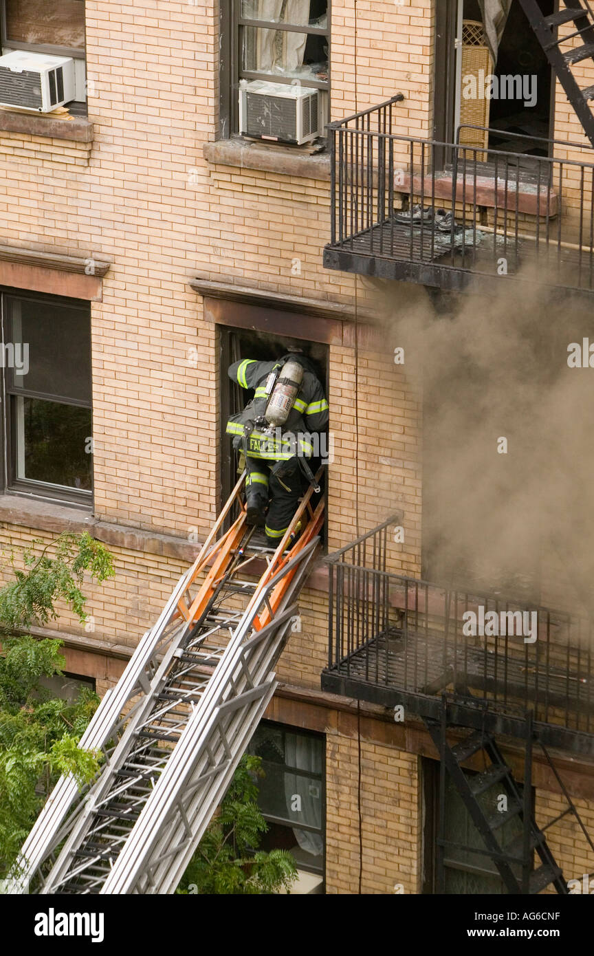 FDNY firefighters intervention on an apartment building fire in Harlem New York City July 2006