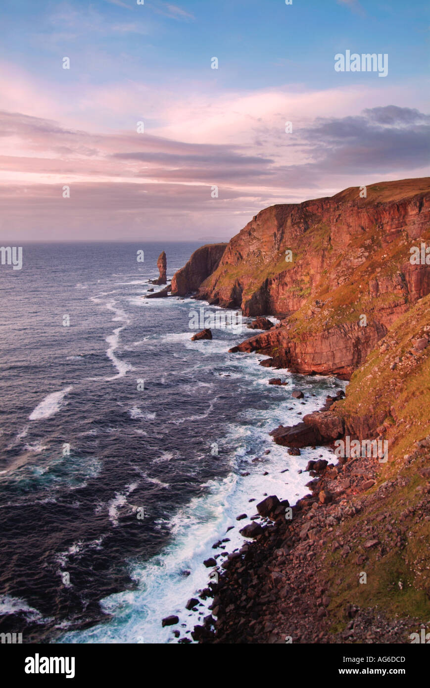 The Old Man of Stoer a sea stack with the coastline Point of Stoer Wester Ross Highlands Scotland UK Stock Photo