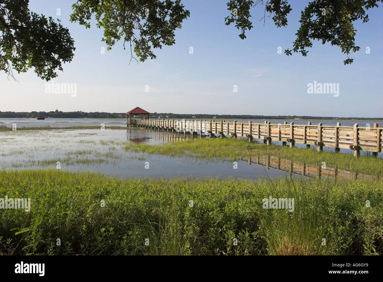 Wooden walkway out to sea at Hilton Head Island in South Carolina, USA Stock Photo