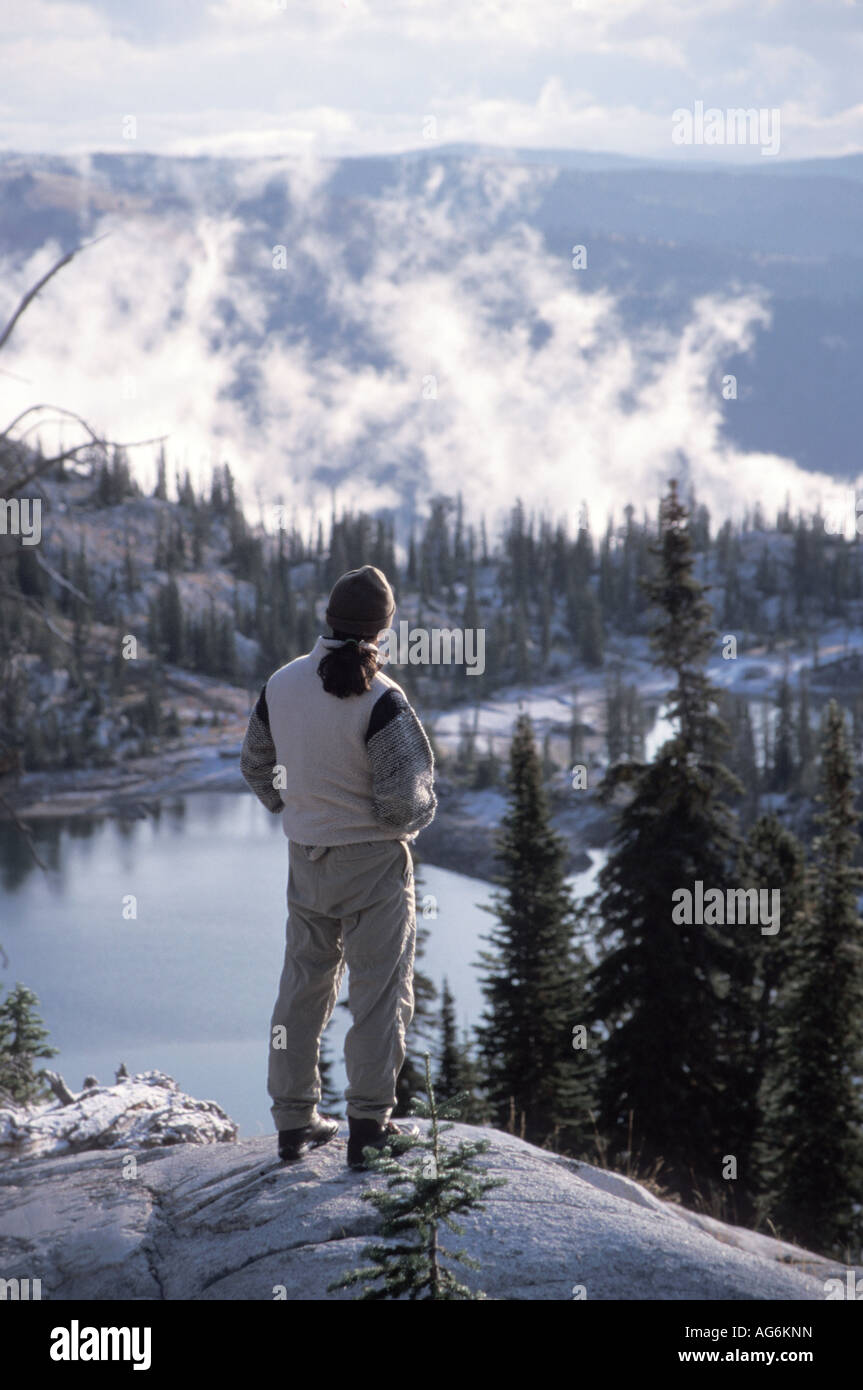 Standing On A Snowy Ridge Overlooking A Mountain Stream Stock Photo - Alamy
