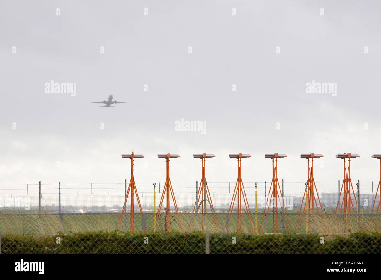 A plane takes off from Heathrow the worlds busiest airport Stock Photo