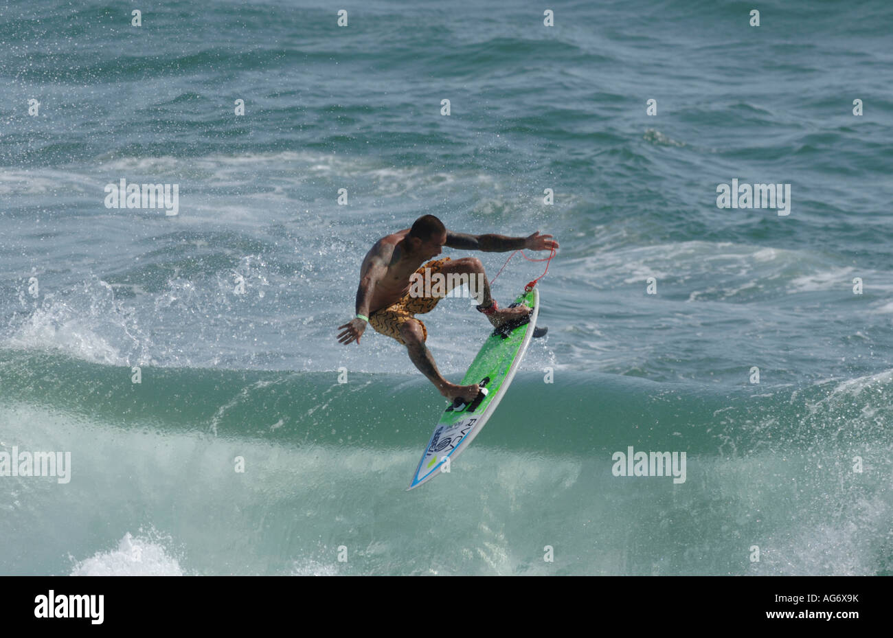 Professional surfer Christian Fletcher flying through the air in