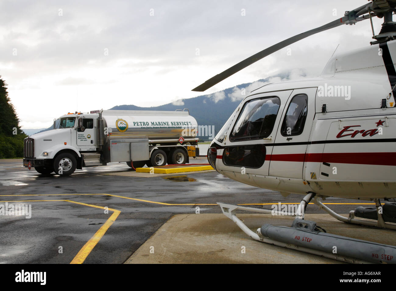 Petro Marine Services truck delivering fuel to ERA Juneau Alaska Stock
