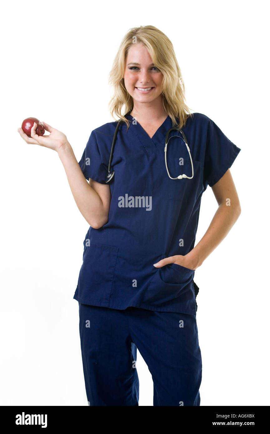 Nurse with apple Stock Photo Alamy