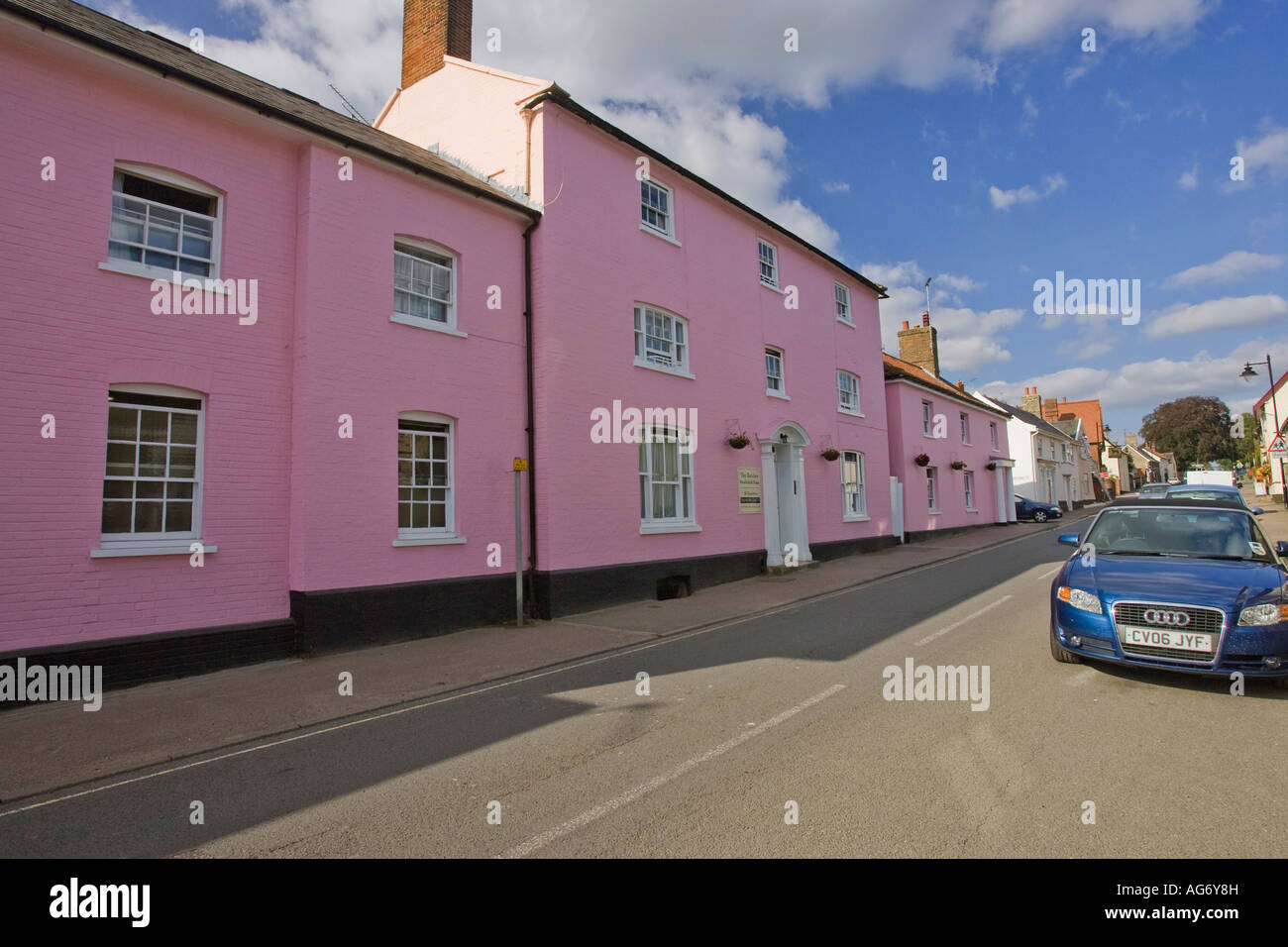 Ixworth village high street in Suffolk showing traditional pink painted houses, 2007 Stock Photo